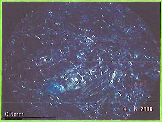 Mesh-like Structure Of Serpentine Minerals In Serpentinite photomicrograph image