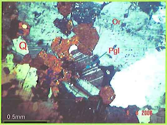 Complex Polysynthetic Twinning In Plagioclase And Augite photomicrogaph image