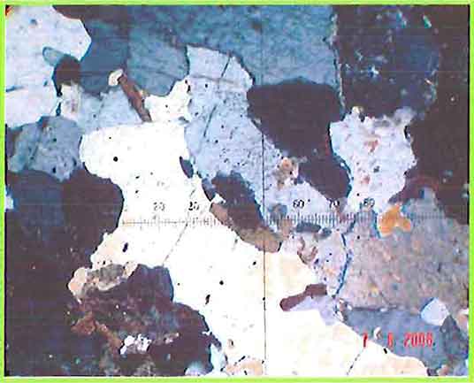 Mineral Constituents Of Biotite Microgranite photomicrogaph image